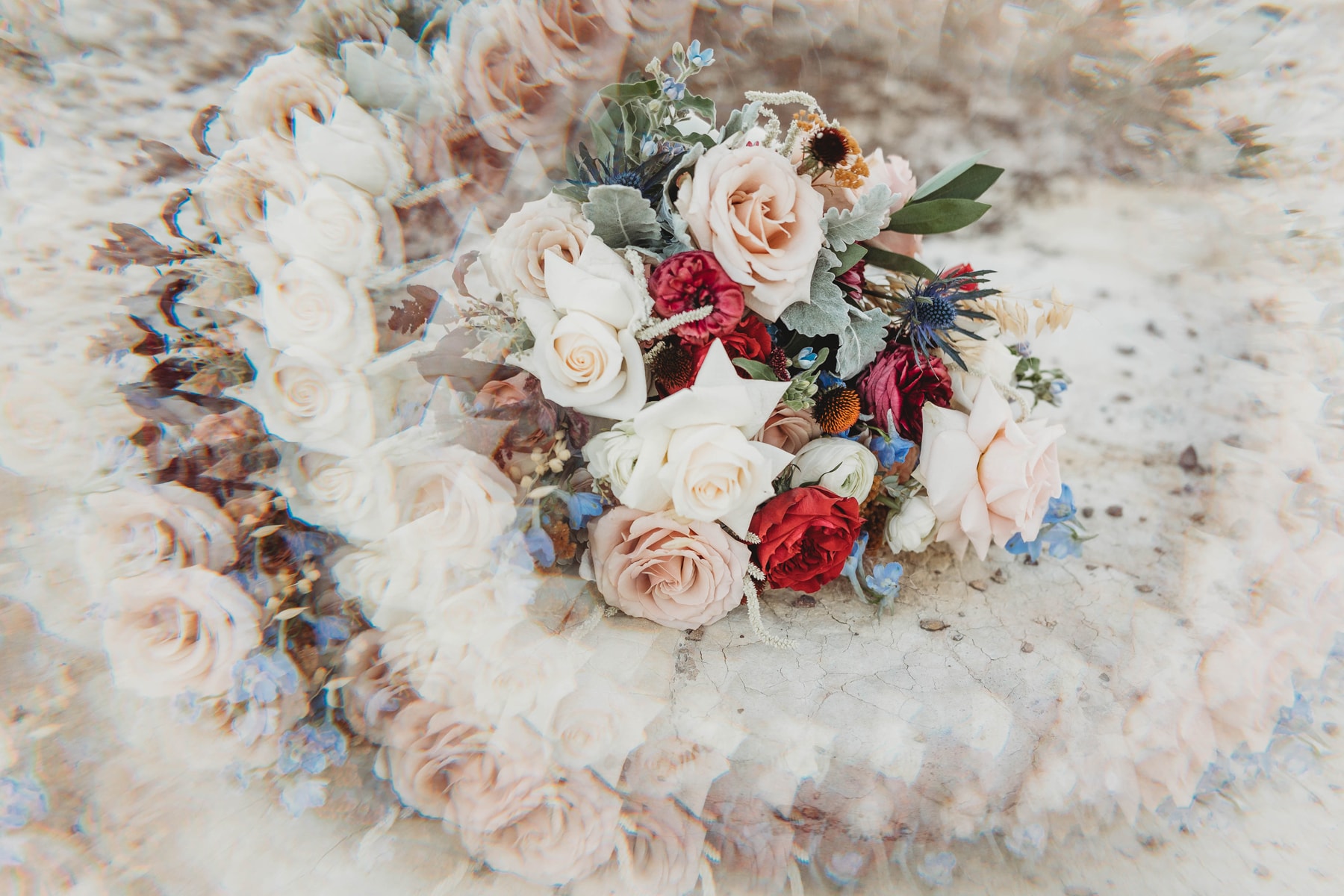 Wedding & Elopement Photographer, a floral arrangement spirals into its centerpiece