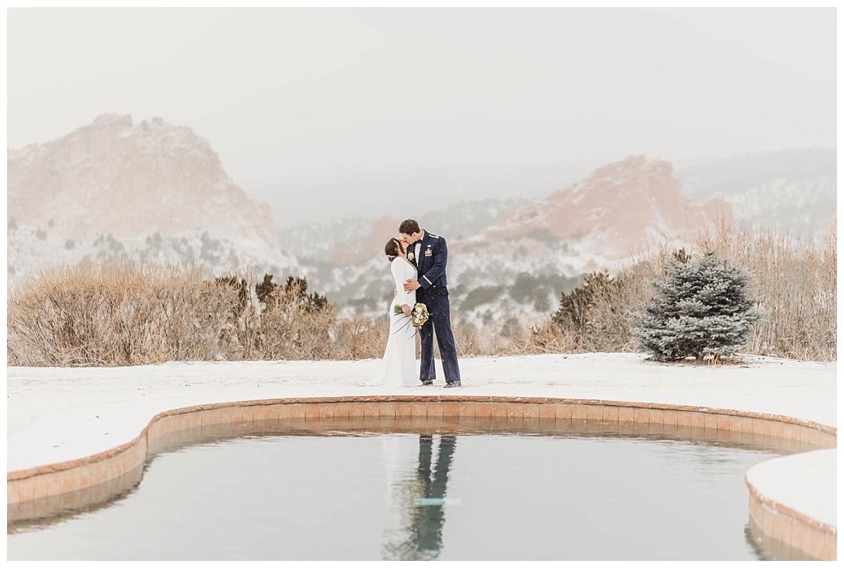 Colorado Springs Wedding Venues, Bride and groom kissing at garden of the gods, military wedding in colorado springs