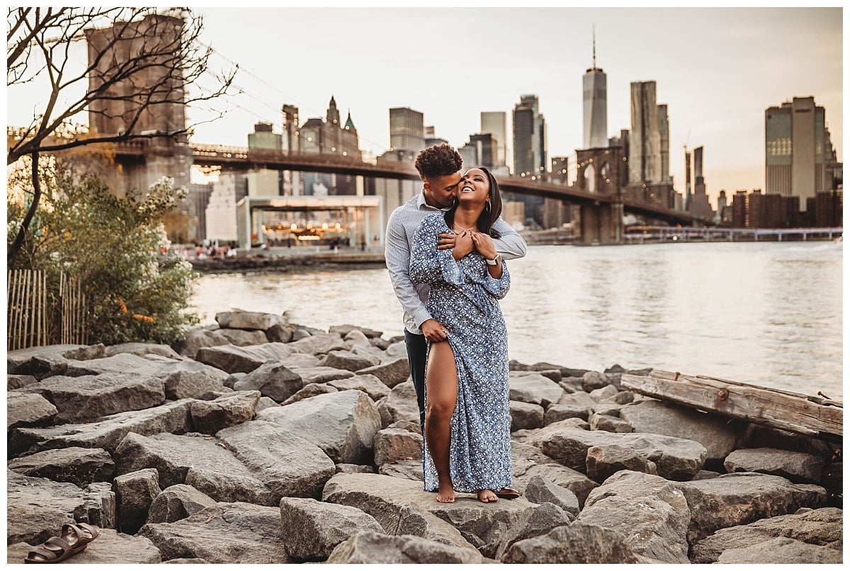 Things To Do After Getting Engaged, engagement session in Brooklyn, brooklyn engagement, couple hugging at brooklyn bridge, new york proposal, couple in new york, city proposal, city surprise proposal, city engagement