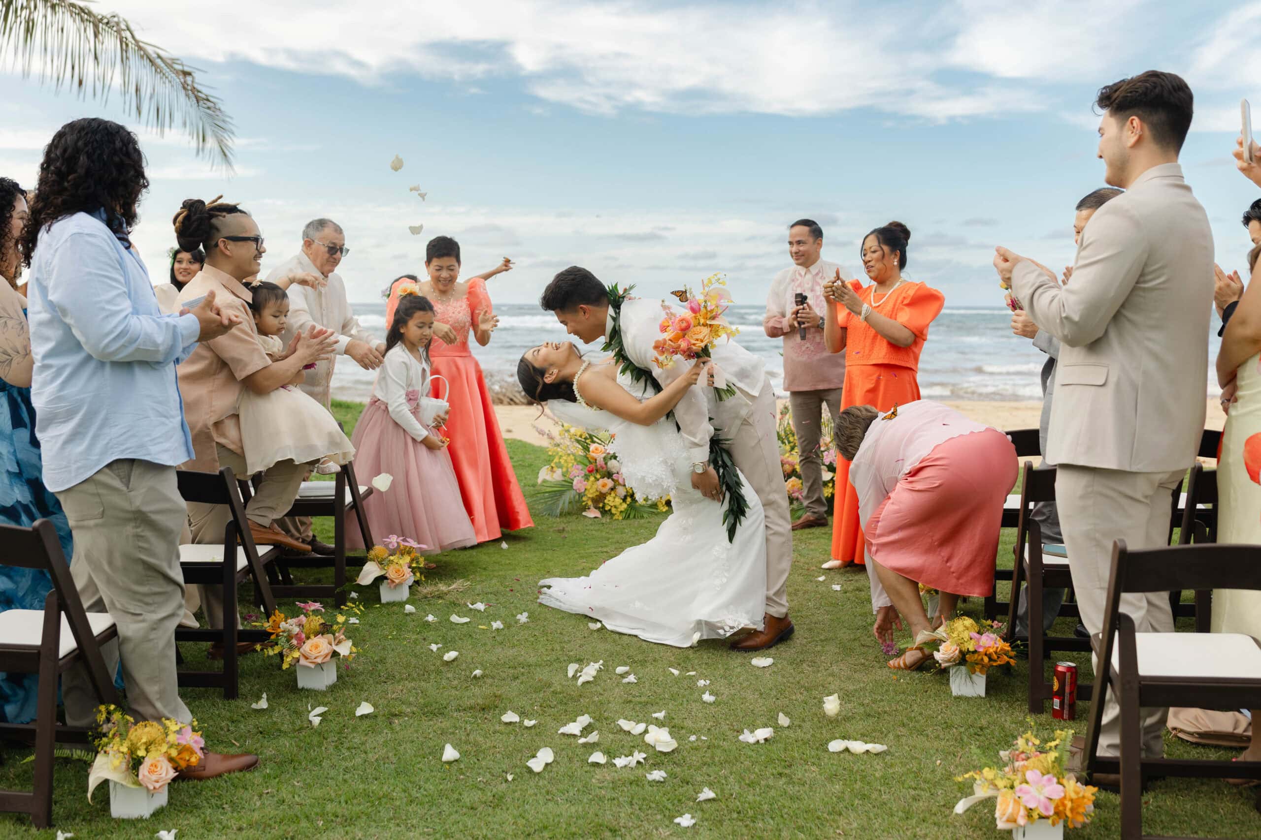 A bride and groom kissing at their wedding ceremony
