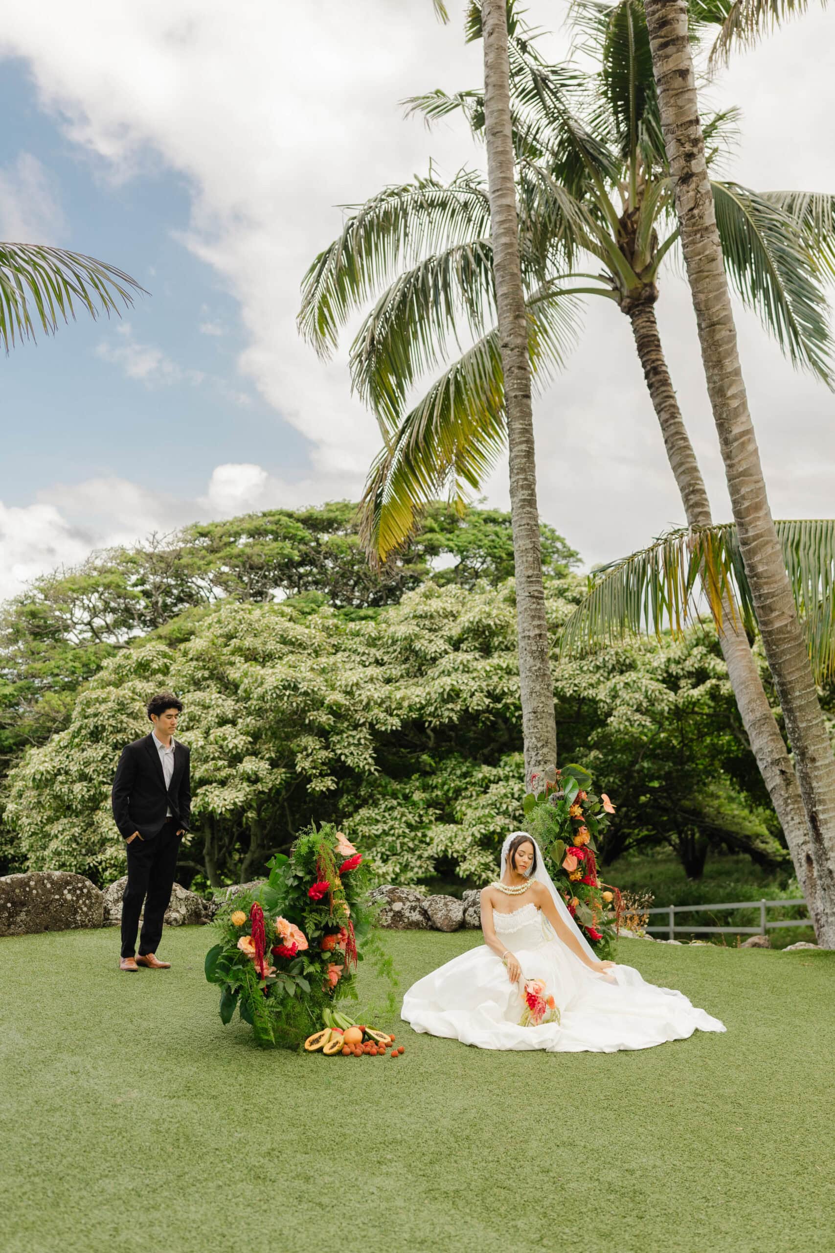 A bride and groom posing for wedding portraits