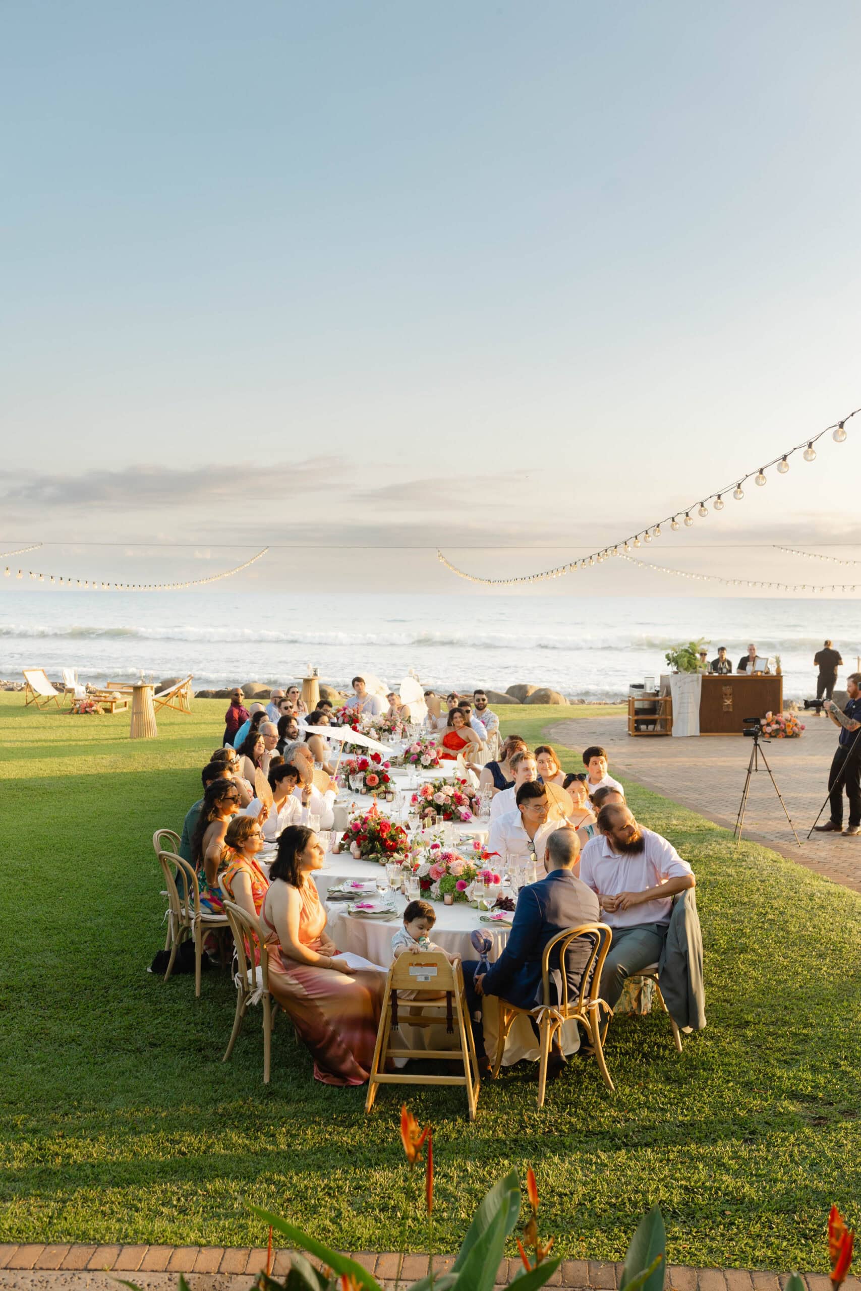 A summer wedding reception in Maui at sunset