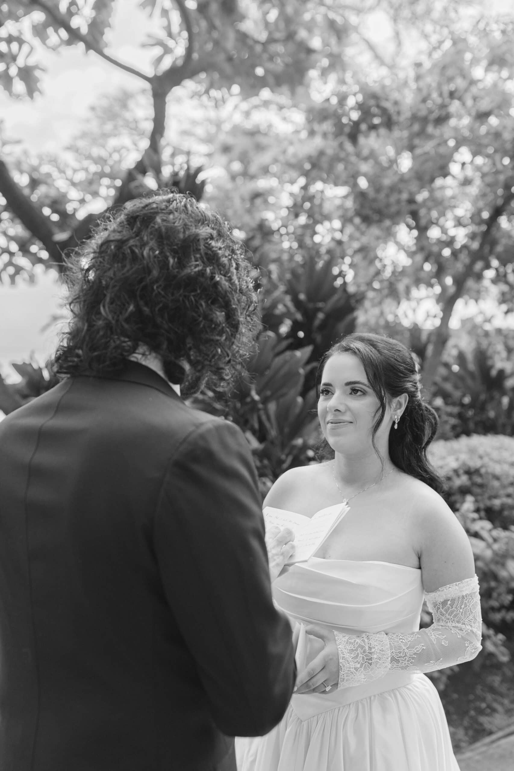 A bride and groom during their private vows