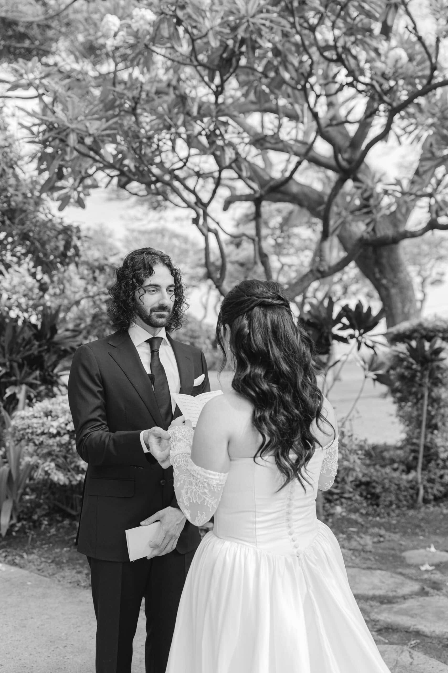 A bride and groom during their private vows