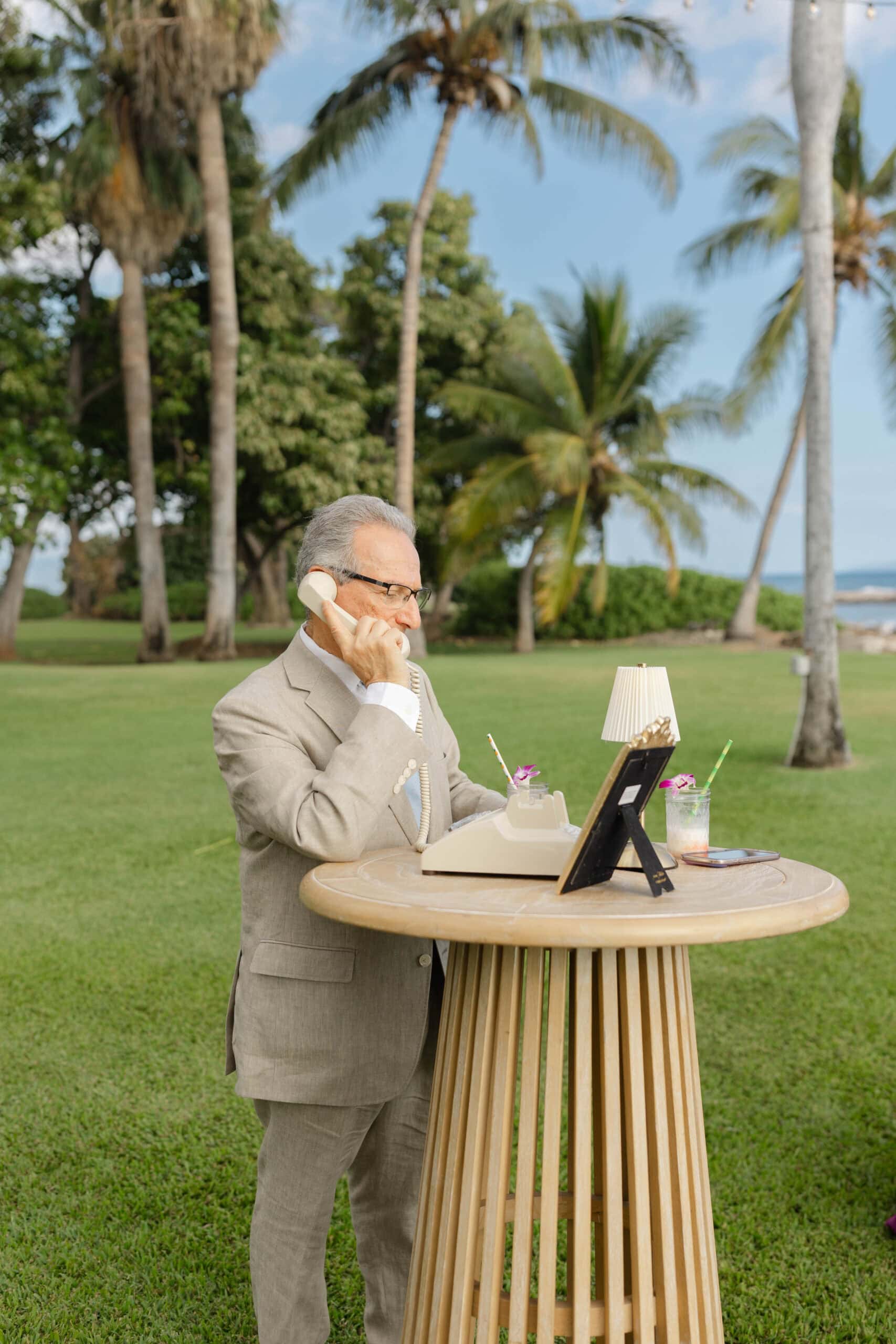 A wedding guest leaving a message on the phone wedding guest book