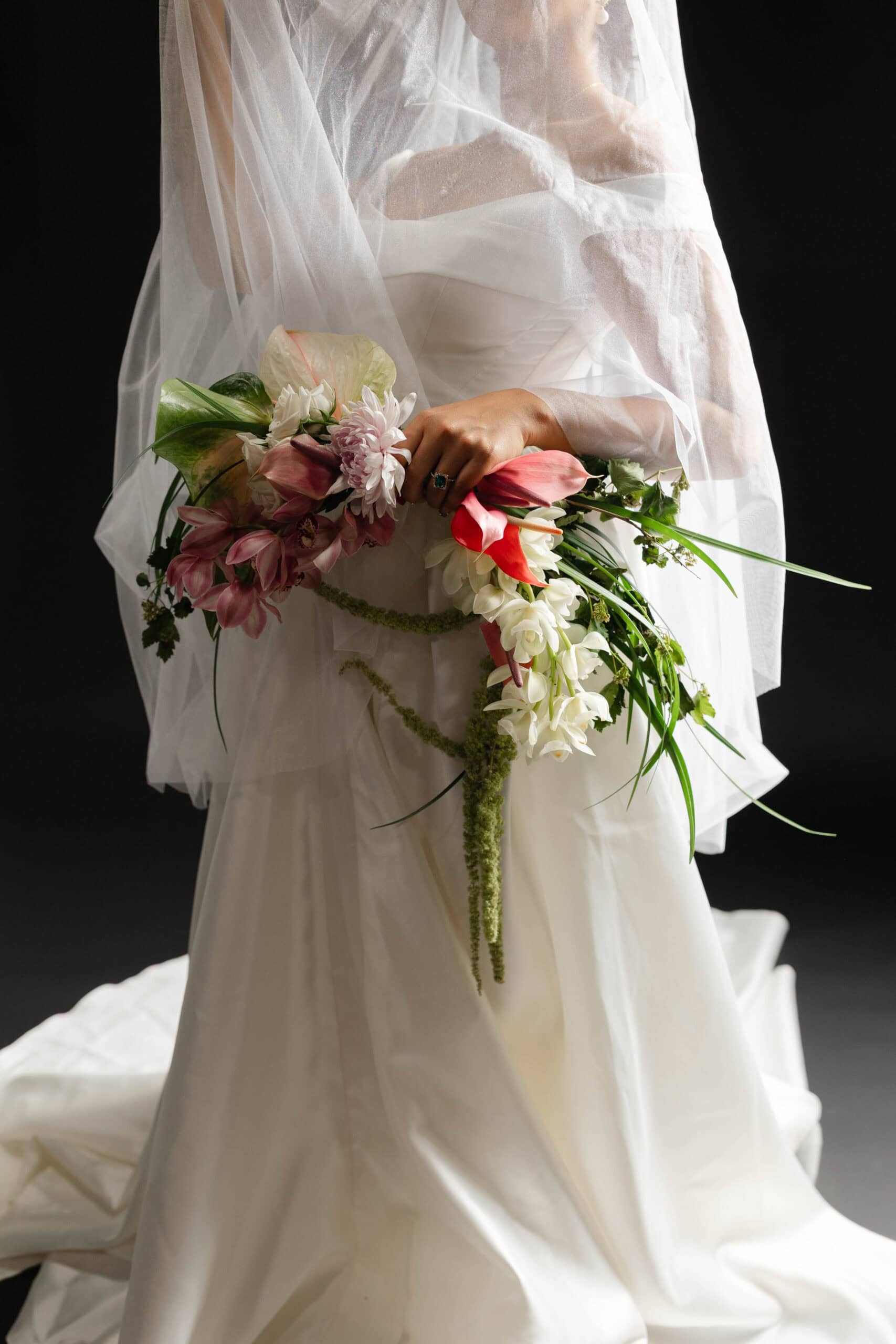 A bride posing for studio bridal portraits