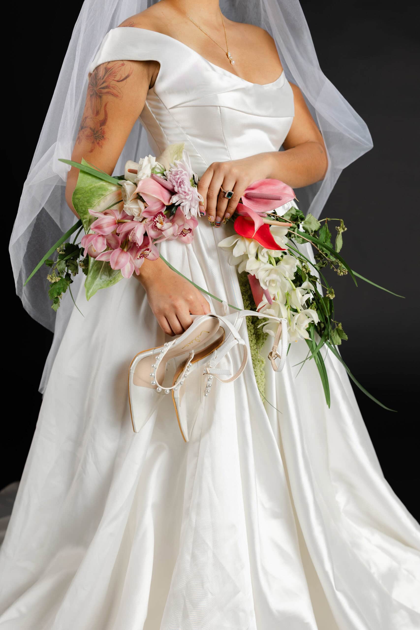 A bride posing for studio bridal portraits