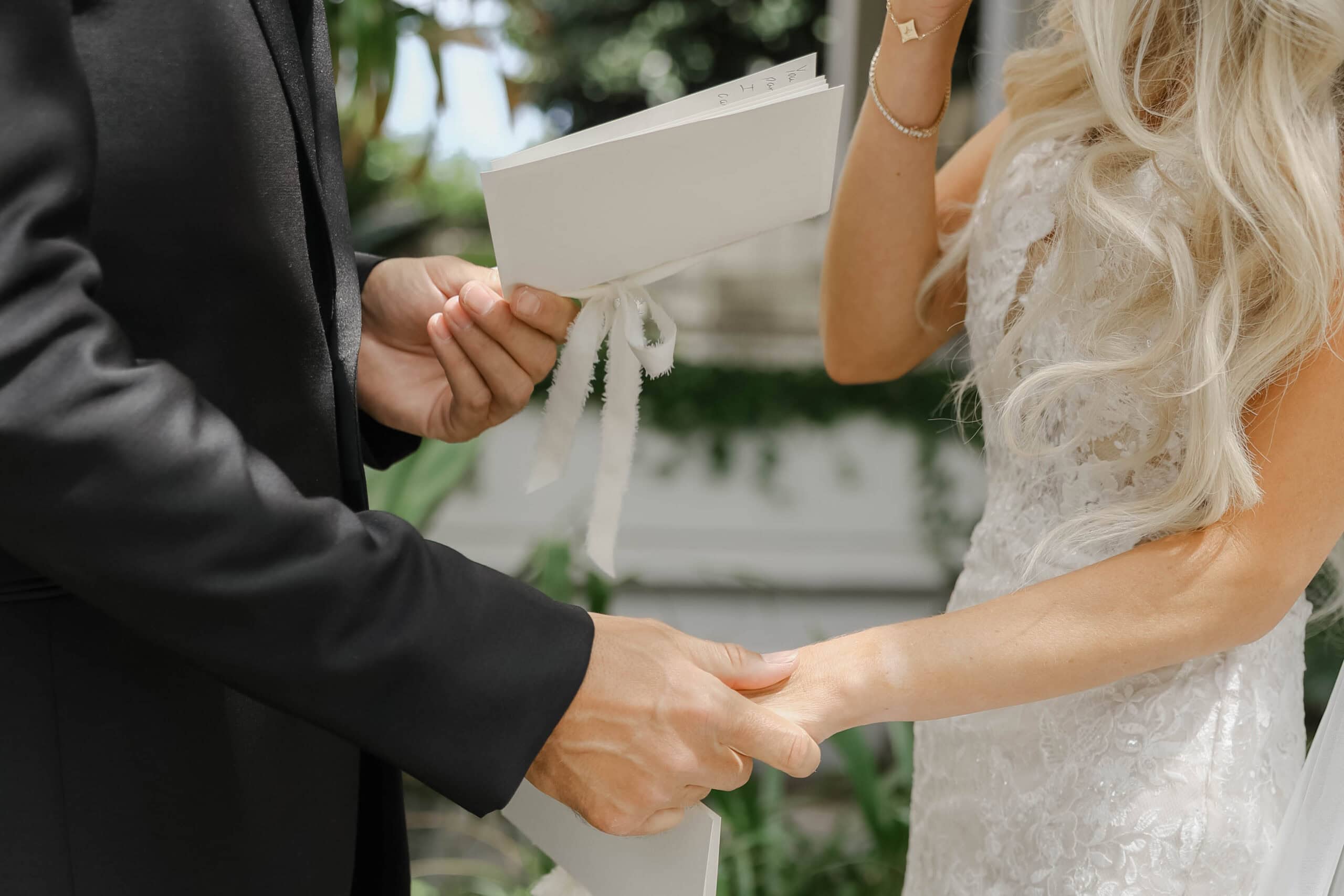 A bride and groom during private vows