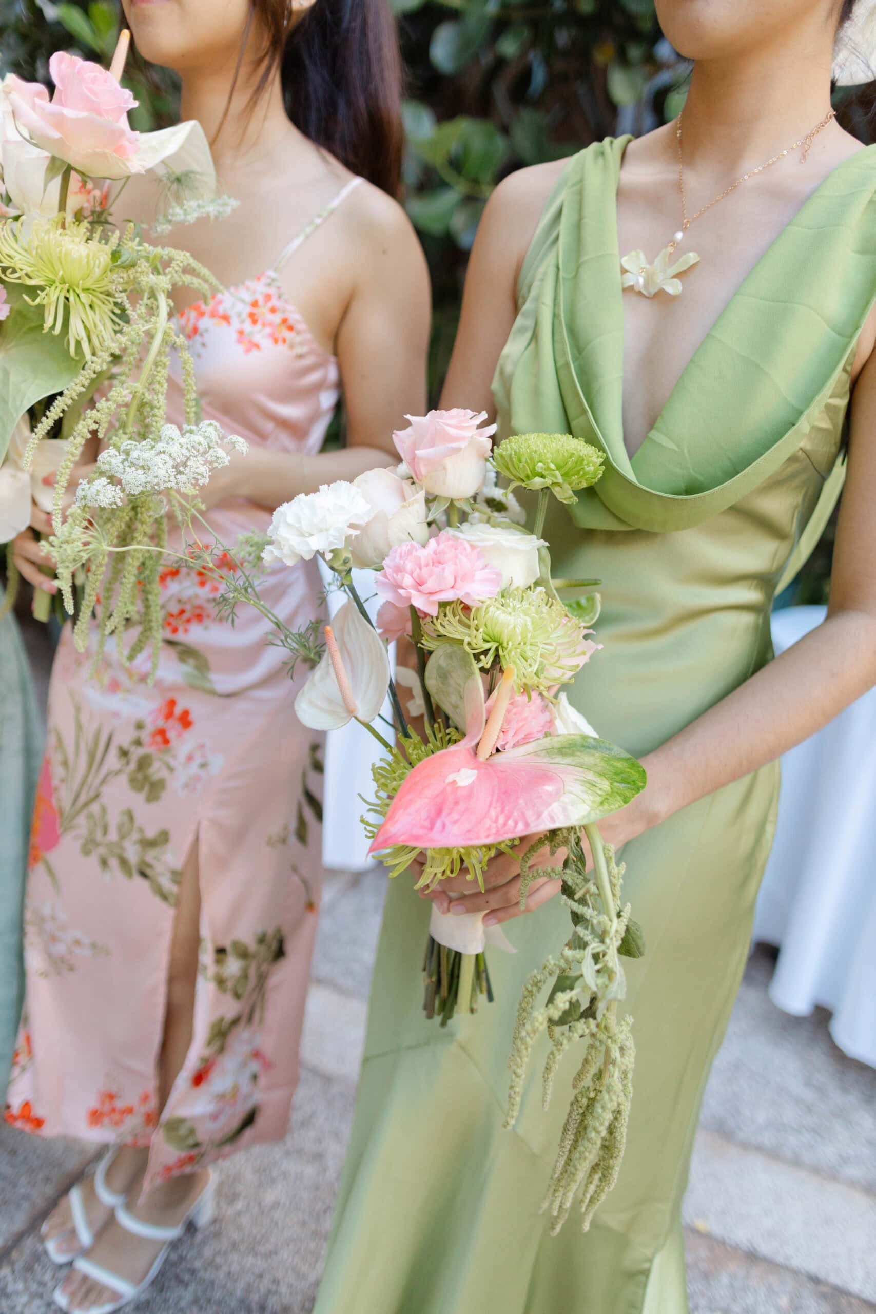 Bridesmaids holding wedding bouquets