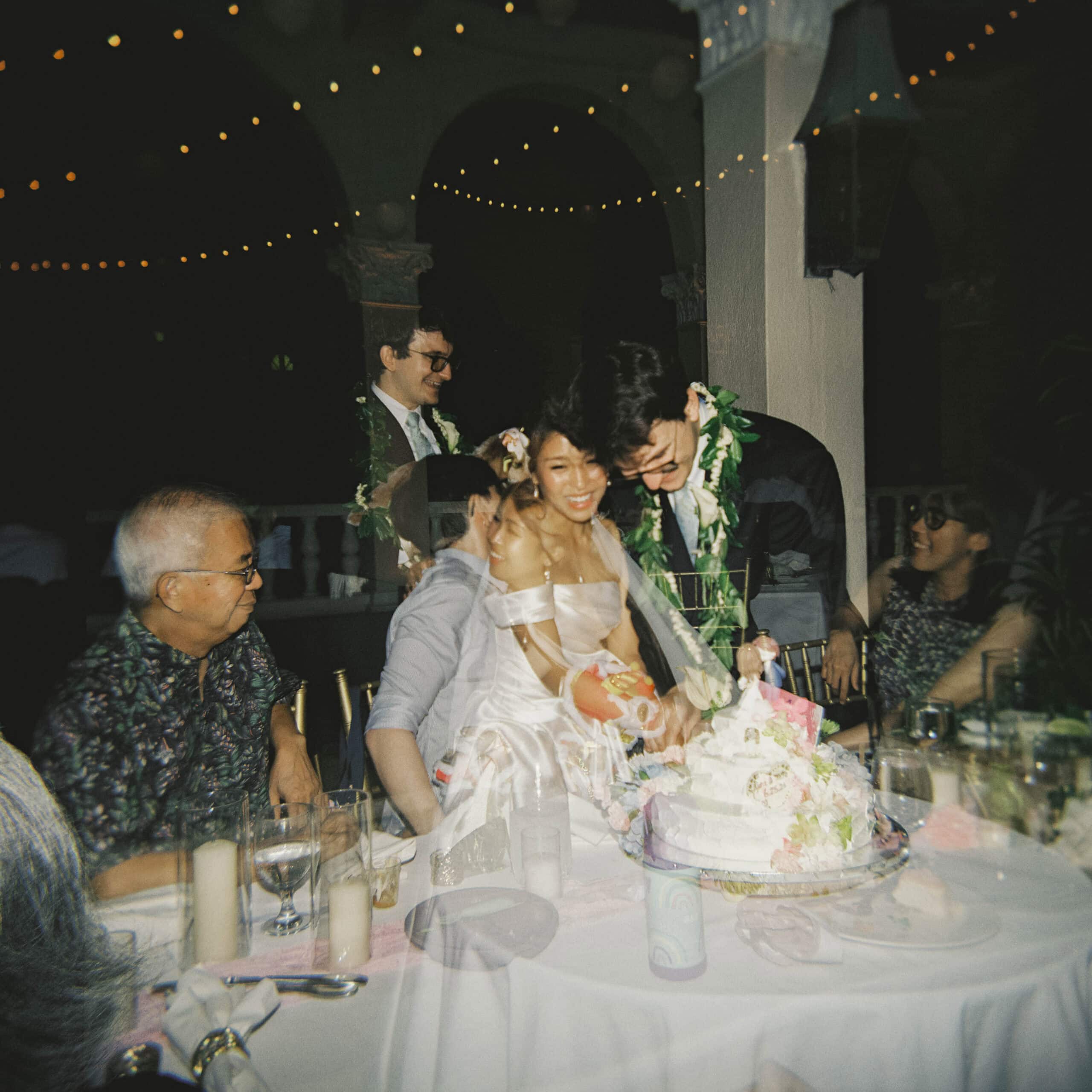 A double exposure wedding photo of a bride and groom at their St. Louis wedding venue reception