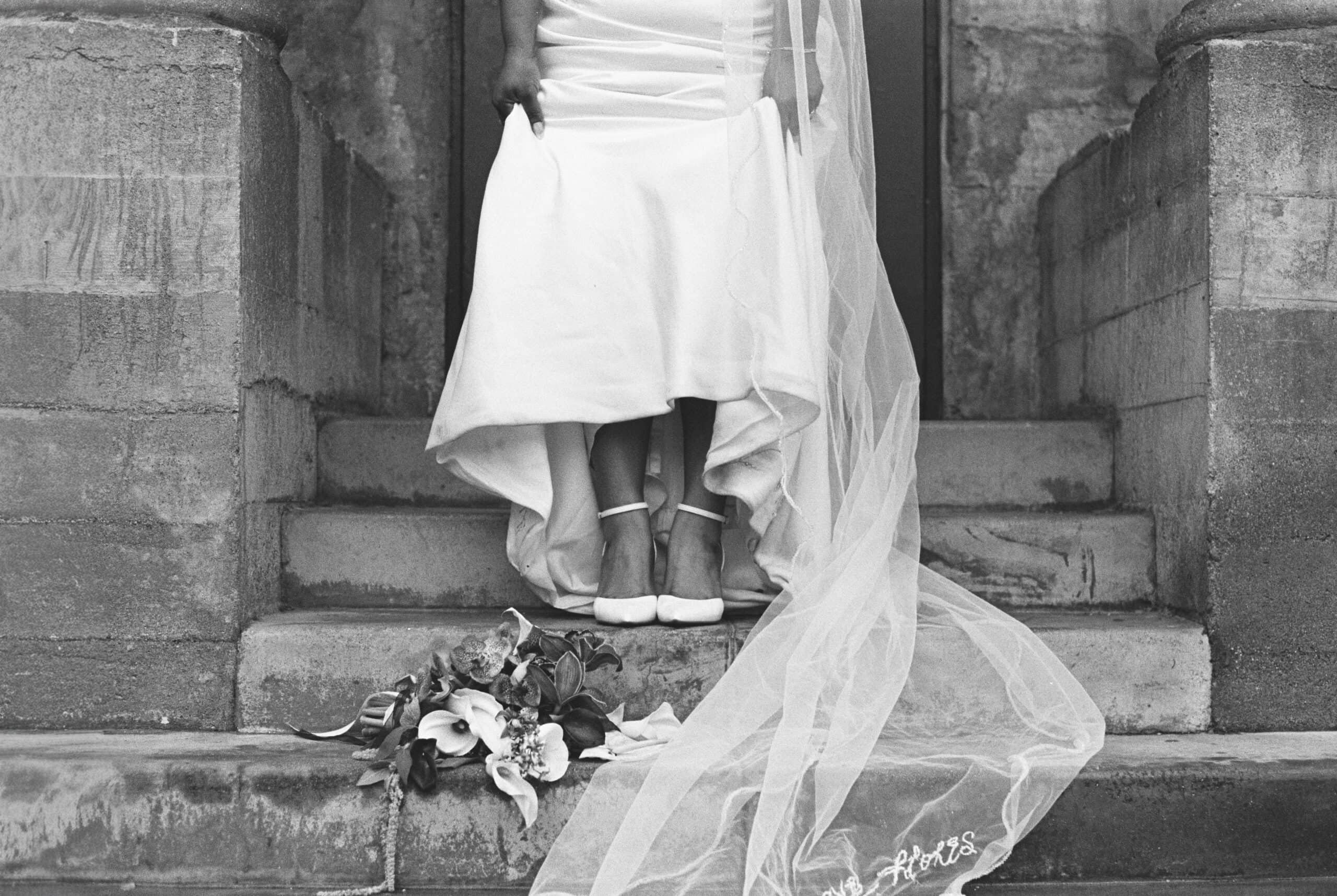 A bride's shoes and bouquet