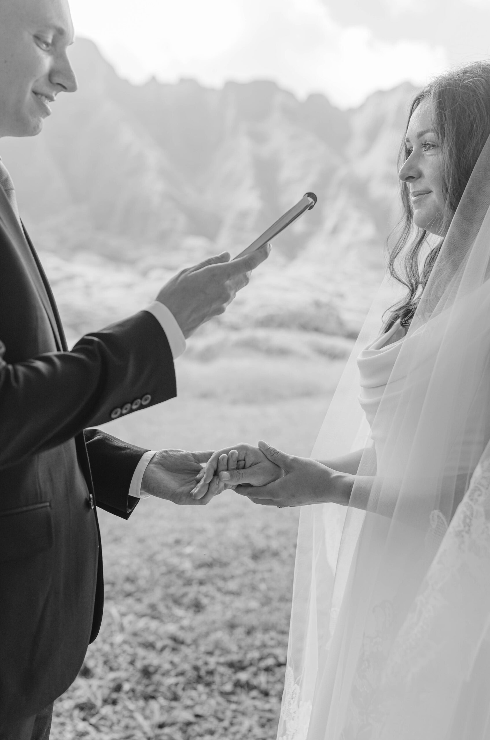 A bride and groom during private vows