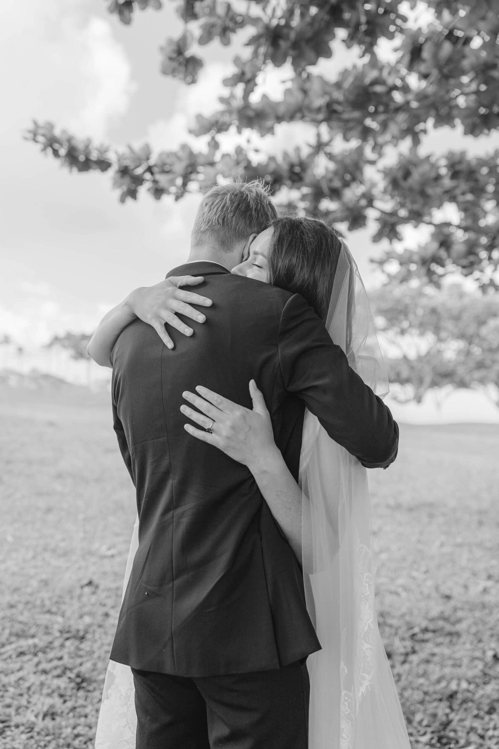 A bride and groom during private vows